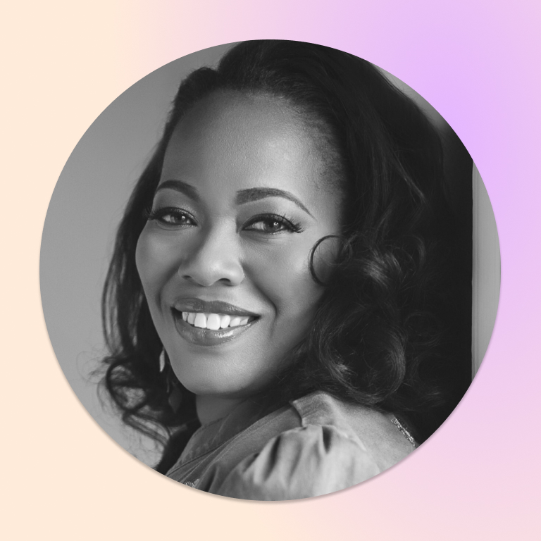 headshot of Prisma team member Shaquita smiling in black and white portrait