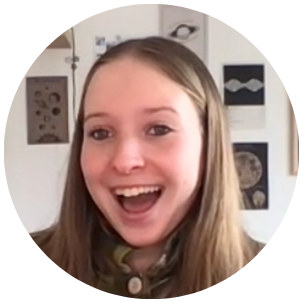 excited Prisma learner smiling on a video call with moon posters in background