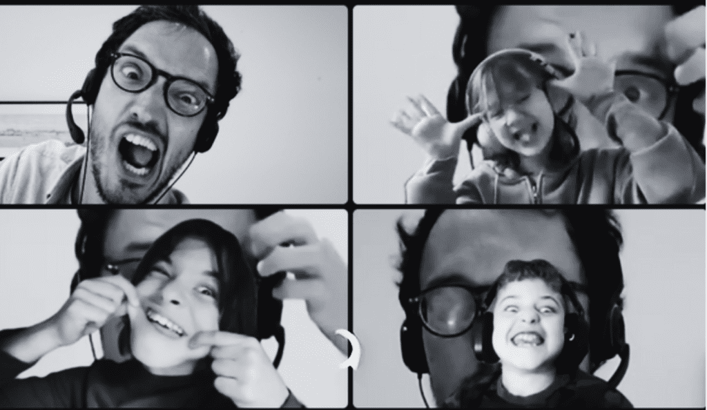 black and white screenshot of a Prisma lower school video call with a coach and three students making silly faces