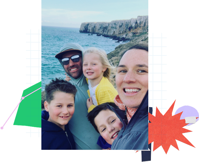 Prisma worldschooling family of five taking a selfie by ocean cliffs