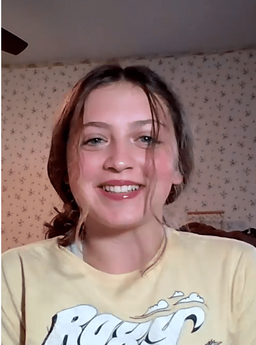 smiling Prisma high school student on a virtual class video call