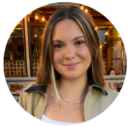 smiling Prisma community member in circular portrait with warm restaurant background